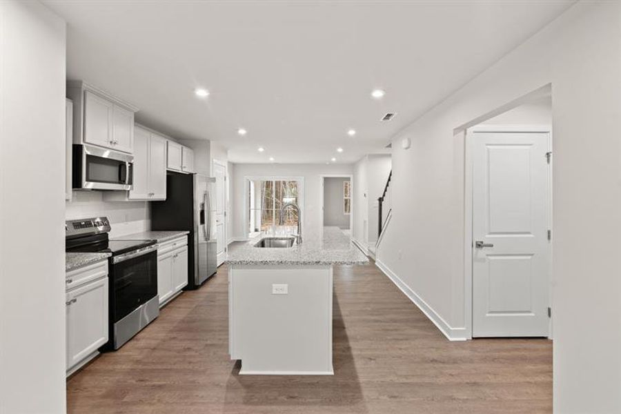 Furnished interior view inside a new home in Middle Creek Village Coastal Cottages & Villas, Bolivia (Image 3).