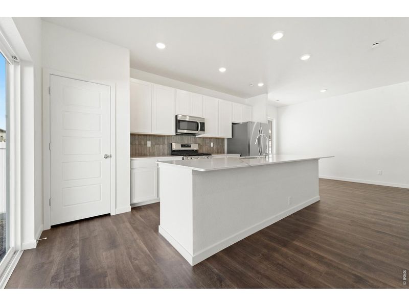 Furnished interior view inside a new home in Union Colony West, Greeley (Image 6).