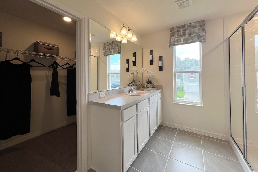 Ashley townhome model in Pine Meadows, Eustis FL — elegant two-story home with 4 bedrooms, 3 baths, and 1,898 sq. ft. of living space. Featuring an open-concept kitchen, dining, and living area, this modern townhome offers flexible layouts for families, guests, or a home office. Highlights include a spacious primary suite with private bath, second-floor laundry, covered lanai, and welcoming entry porch. Built with energy efficiency and stylish design, the Ashley townhome blends comfort, functionality, and charm in a sought-after Central Florida community.