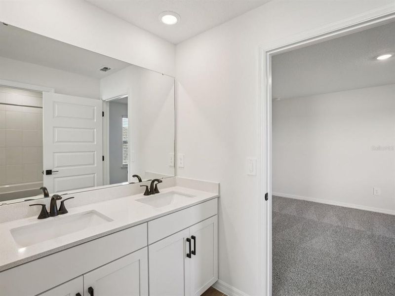 Furnished interior view inside a new home in Two Rivers - Signature Series, Zephyrhills (Image 15).