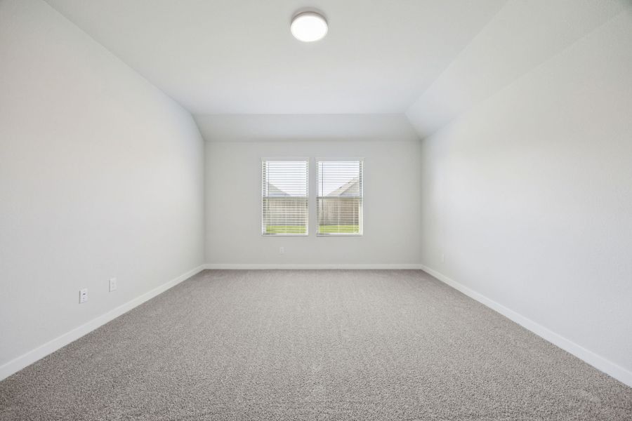 Primary Suite in the Heisman home plan by Trophy Signature Homes – REPRESENTATIVE PHOTO Primary Suite in the Heisman home plan by Trophy Signature Homes – REPRESENTATIVE PHOTO