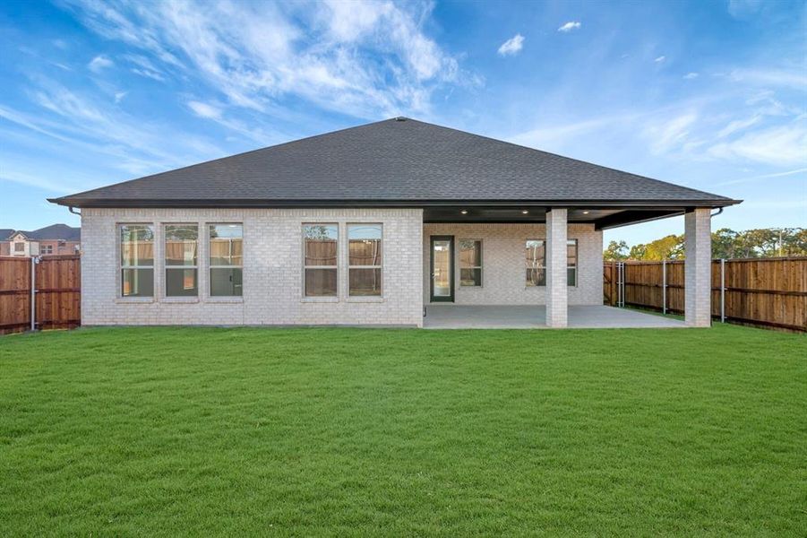 Exterior details and patio area of a home in Sterling Greene, Arlington (Image 3). Exterior details and patio area of a home in Sterling Greene, Arlington (Image 3).
