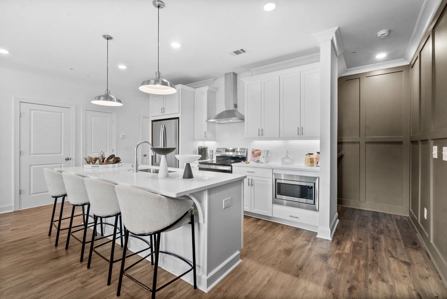 Representative furnished interior of a home built from the The Magnolia by The Providence Group in Market Square at Sawnee Village, Cumming (Image 5).