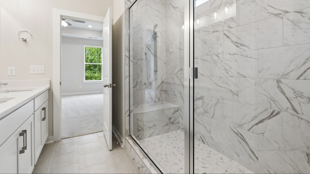 Primary bathroom with dual vanity
