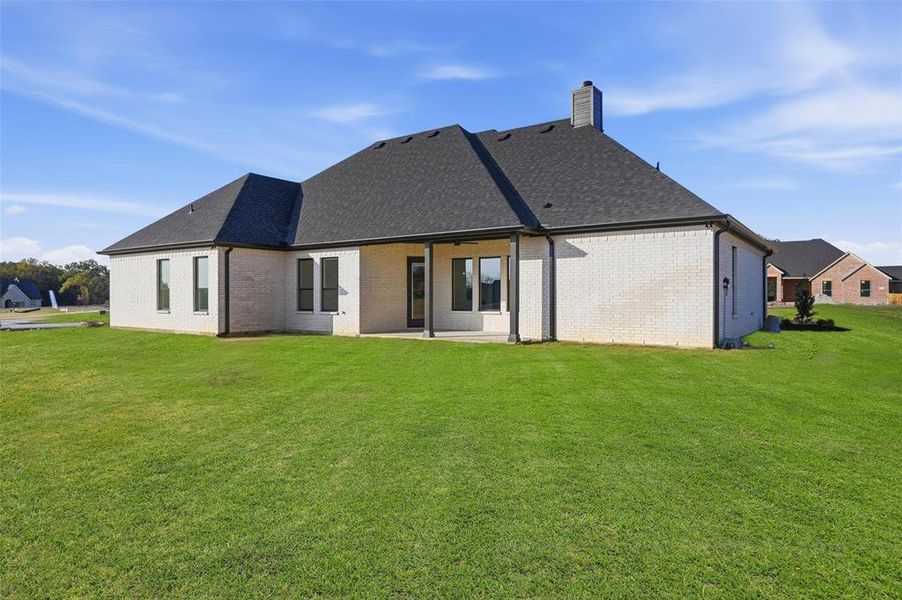Exterior details and patio area of a home in , Azle (Image 3).