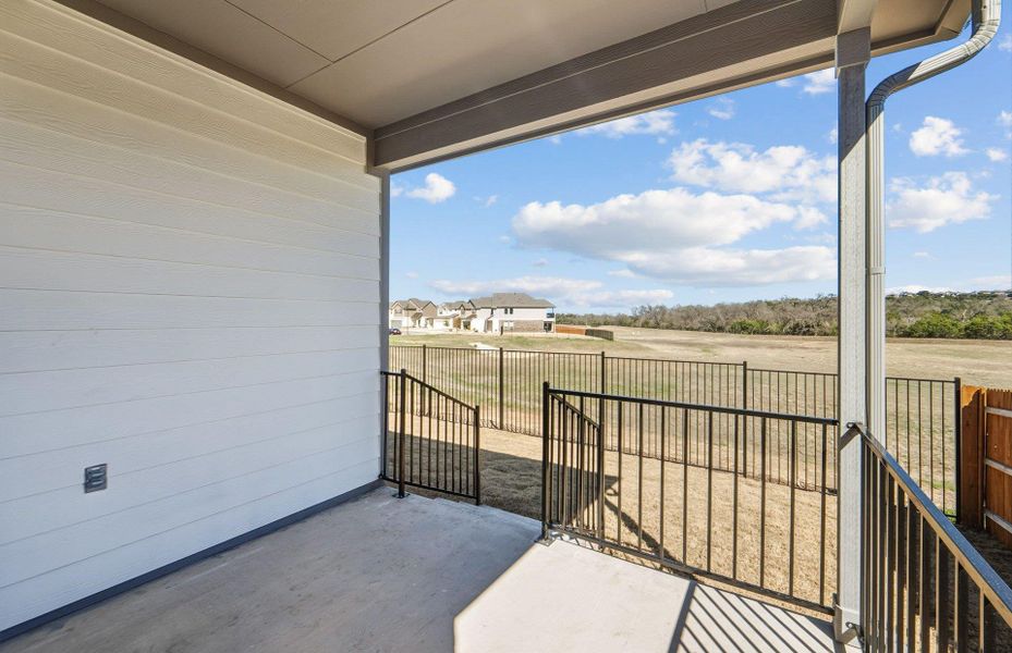 Exterior details and patio area of a home in Saddleback at Santa Rita Ranch, Liberty Hill (Image 17).