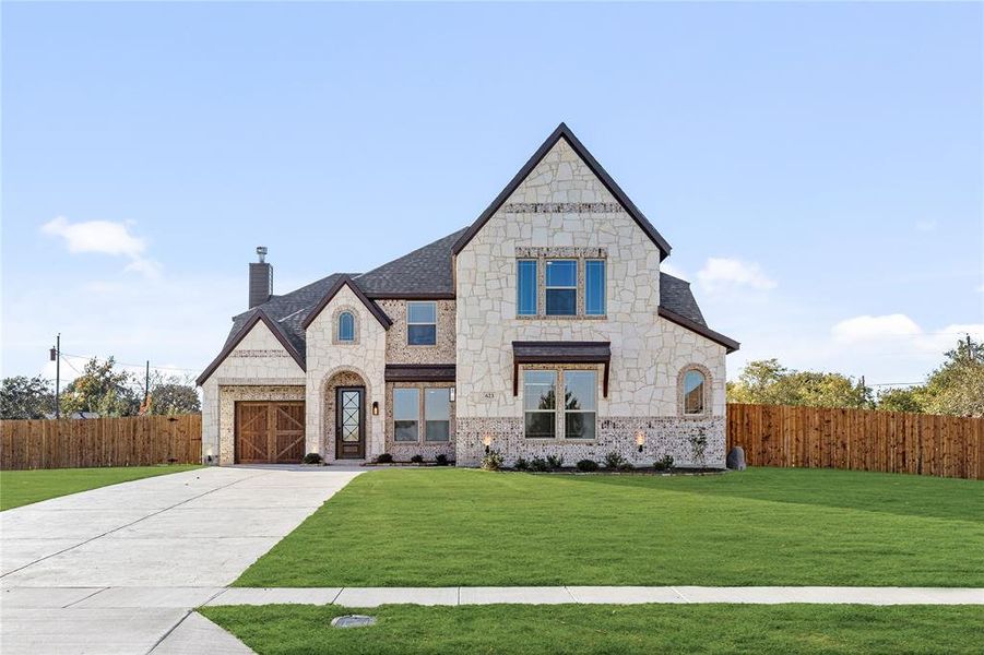 Front exterior of a new home in Crystal Lake Estates, Red Oak, TX, highlighting curb appeal (Image 1). Front exterior of a new home in Crystal Lake Estates, Red Oak, TX, highlighting curb appeal (Image 1).