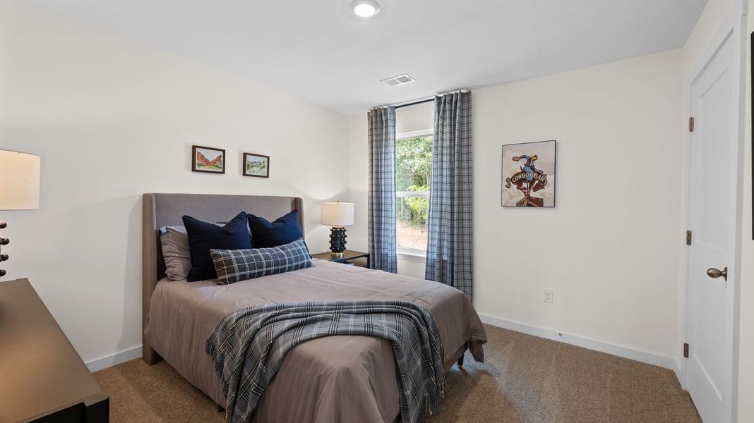 Furnished interior view inside a new home in Lone Oaks Farm, Cleveland (Image 31).