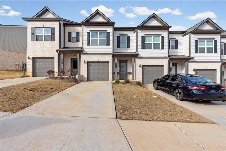 Front exterior of a new home in , Cartersville, GA, highlighting curb appeal (Image 23).