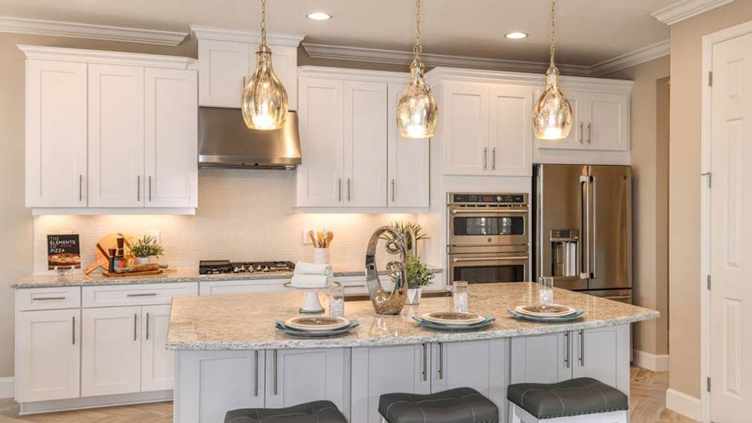 Representative furnished interior of a home built from the Barbados by Taylor Morrison in Central Park, Port St. Lucie (Image 7).