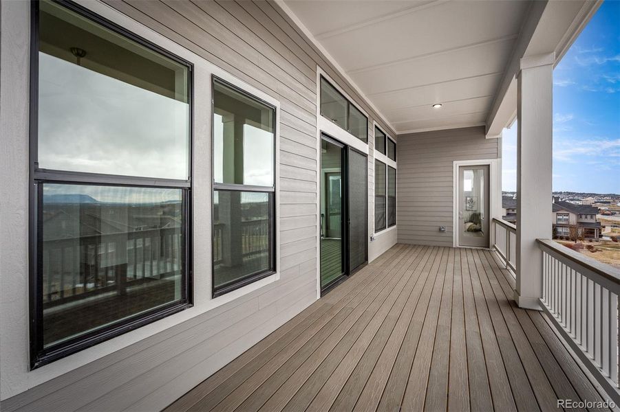 Exterior details and patio area of a home in Cloverleaf - Pinnacle Collection, Monument (Image 3).