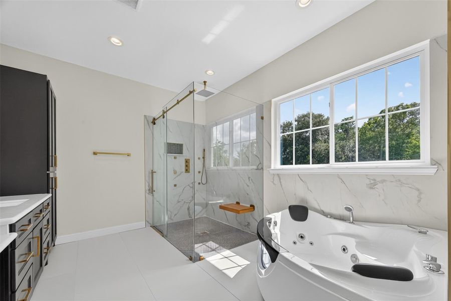 Welcome to Your Private Home Spa Retreat. Step into pure luxury with a ceiling-mounted 12-inch thermostatic rain shower system, complete with invigorating body jets that deliver a soothing, full-body spray for the ultimate shower experience.