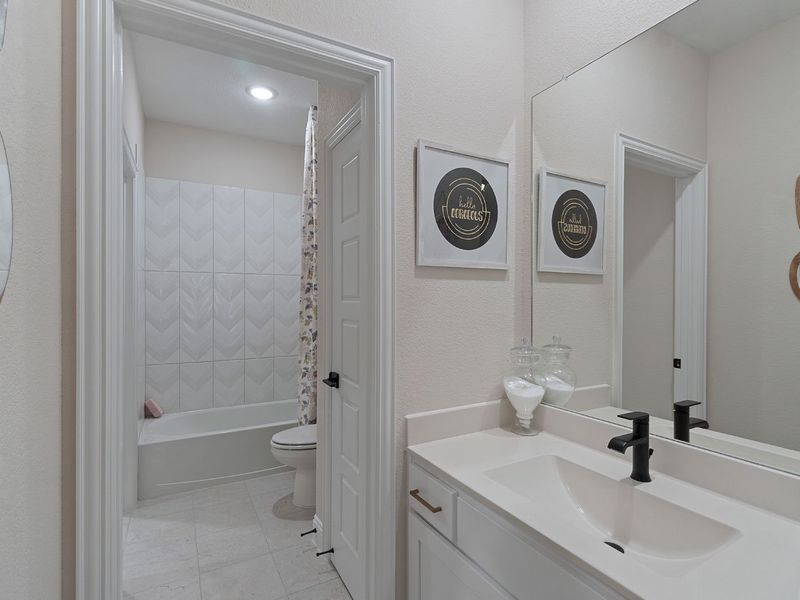Representative furnished interior of a home built from the Middleton by Landon Homes in Lexington Frisco, Frisco (Image 30).