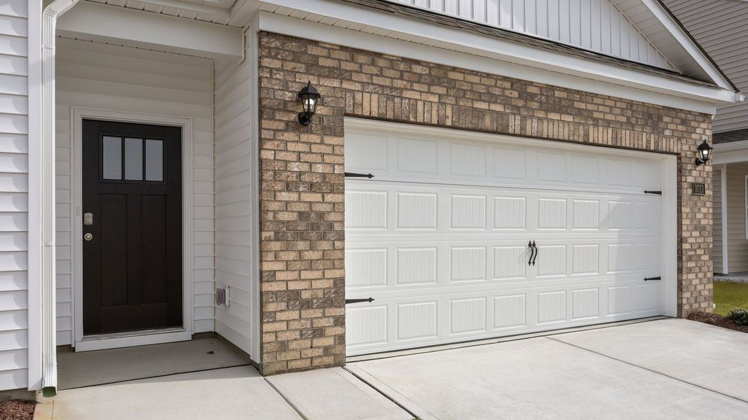 Exterior details and patio area of a home in Ridgewood Farms, Winterville (Image 3).