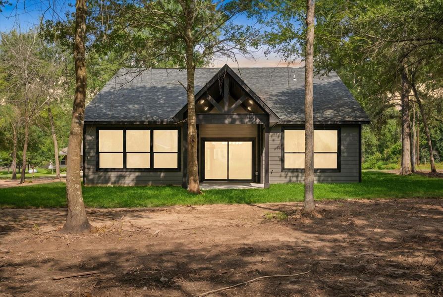 Front exterior of a new home in , Hempstead, TX, highlighting curb appeal (Image 25). Front exterior of a new home in , Hempstead, TX, highlighting curb appeal (Image 25).