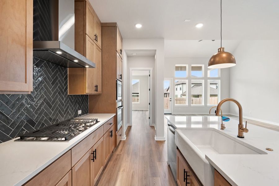 Furnished interior view inside a new home in Arbor Collection at Lariat, Liberty Hill (Image 10). Furnished interior view inside a new home in Arbor Collection at Lariat, Liberty Hill (Image 10).