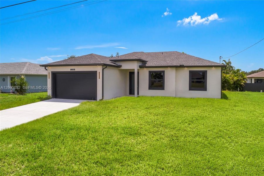 Front exterior of a new home in , Cape Coral, FL, highlighting curb appeal (Image 17).