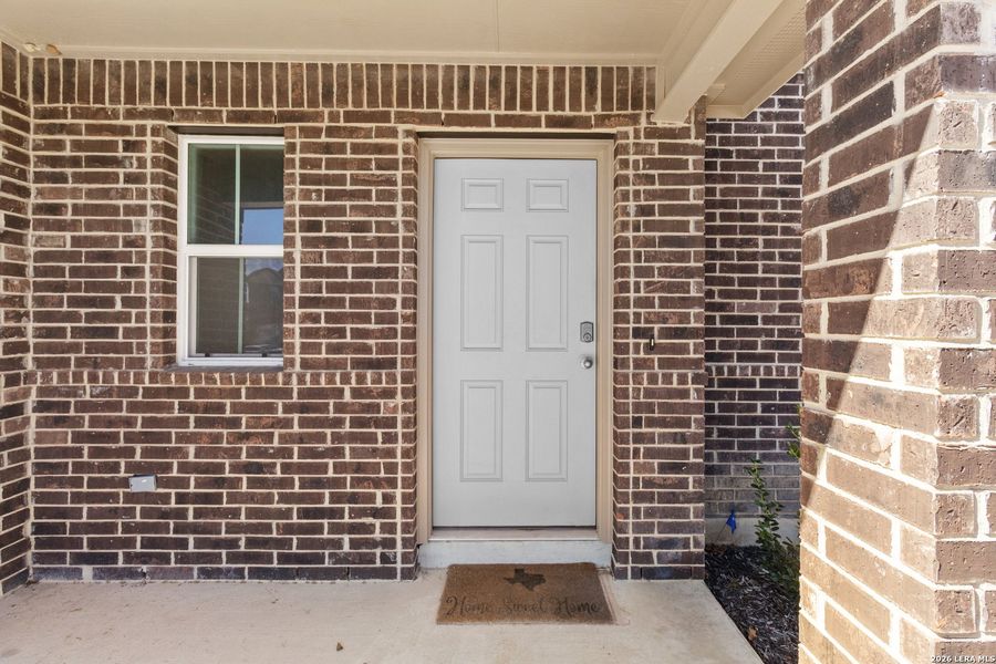 Exterior details and patio area of a home in Redbird Ranch, San Antonio (Image 25).