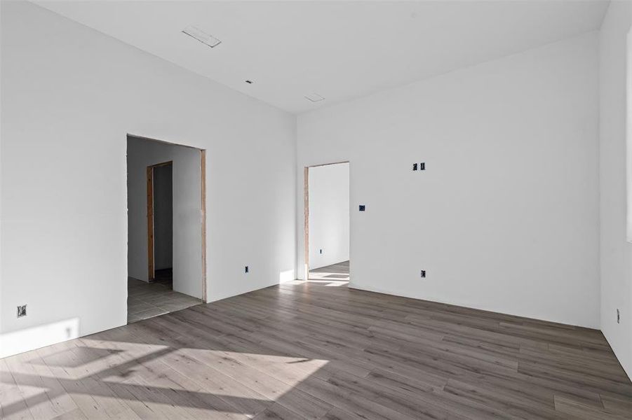 Unfurnished room with light wood-type flooring Unfurnished room with light wood-type flooring