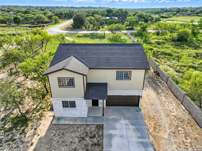 Front exterior of a new home in , Lytle, TX, highlighting curb appeal (Image 17). Front exterior of a new home in , Lytle, TX, highlighting curb appeal (Image 17).