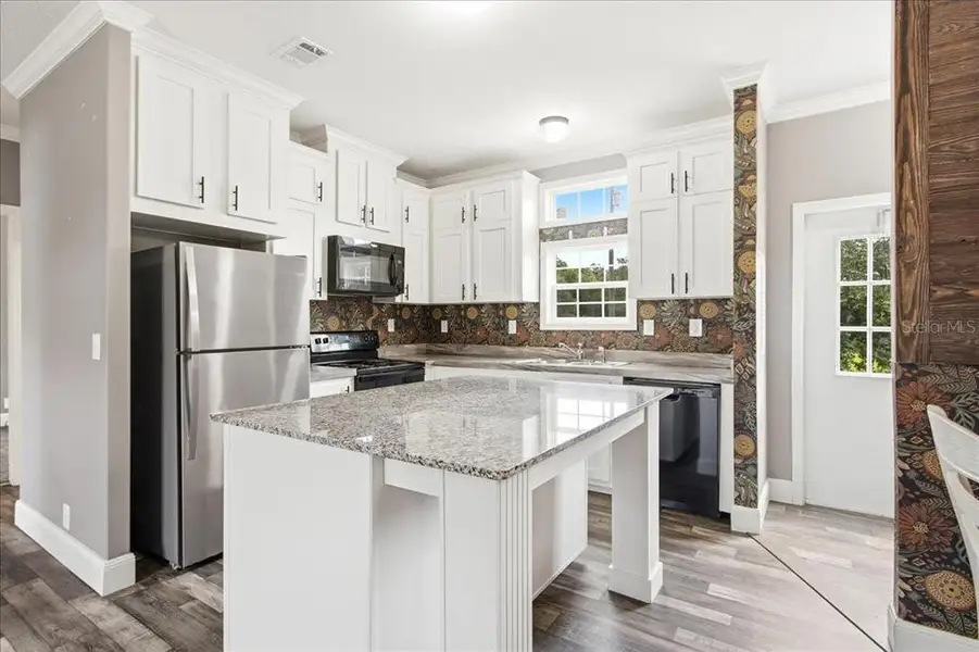 Furnished interior view inside a new home in , Bushnell (Image 4).