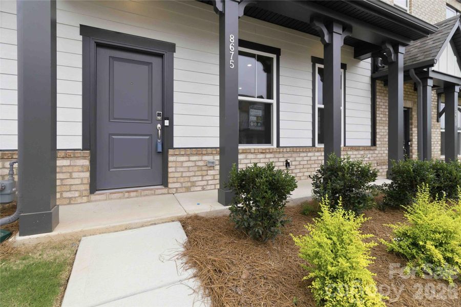 Exterior details and patio area of a home in Ridge at Sugar Creek, Indian Land (Image 3).