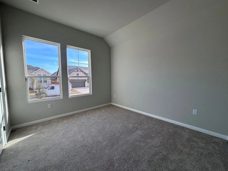 Spacious, unfurnished interior of a new home in The Colony, Bastrop (Image 12).