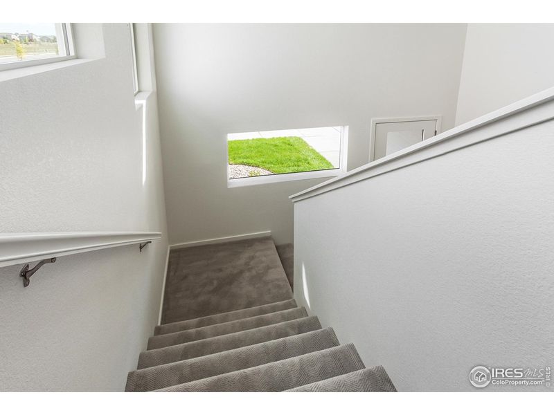 Spacious, unfurnished interior of a new home in Trailside Story Collection - Single Family Homes, Timnath (Image 26).