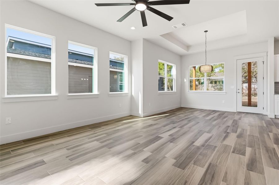 Living area & dining area virtually without virtual staging