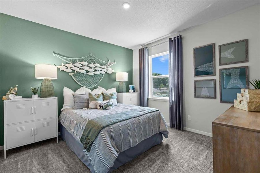 Furnished interior view inside a new home in The Cypress Series at Reserve East, Flagler Beach (Image 24).