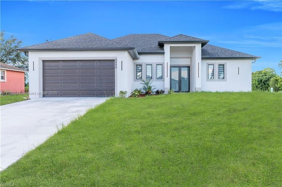 Front exterior of a new home in , Lehigh Acres, FL, highlighting curb appeal (Image 23). Front exterior of a new home in , Lehigh Acres, FL, highlighting curb appeal (Image 23).
