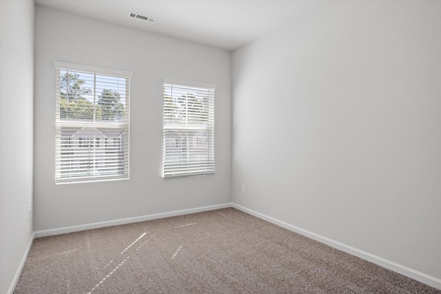 Spacious, unfurnished interior of a new home in West Main Townhomes, Sanford (Image 25).