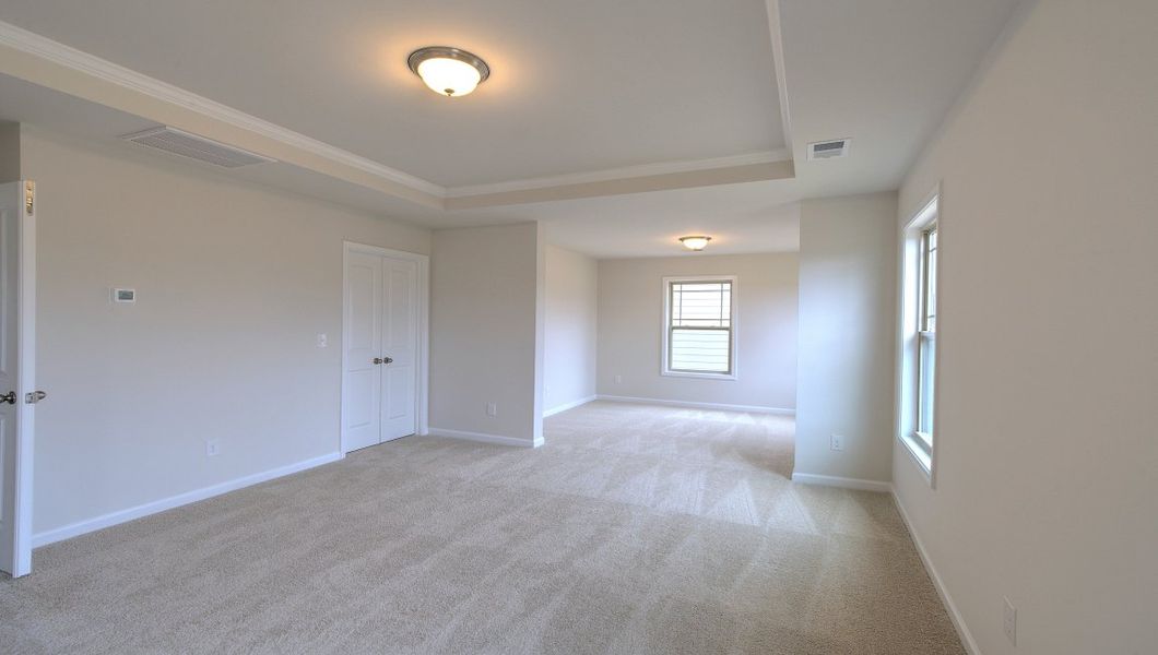 Spacious, unfurnished interior of a new home in Reserve at Tap Root Farms, Fletcher (Image 27).