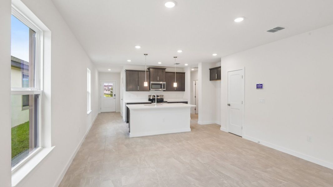 Furnished interior view inside a new home in Grasslands West, Lakeland (Image 15).