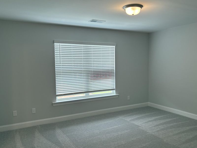 Spacious, unfurnished interior of a new home in Parker's Preserve, Ridgeville (Image 29).