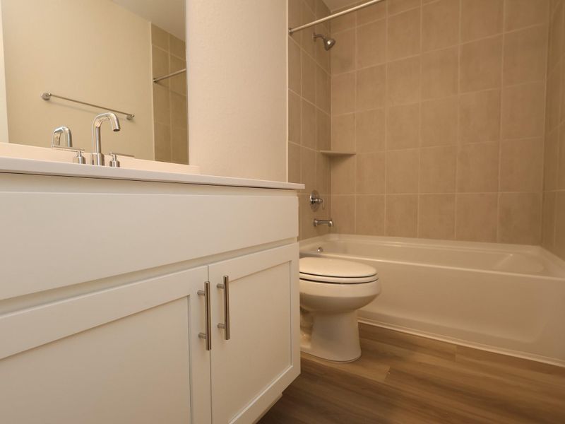 Furnished interior view inside a new home in Pinewood at Grand Texas, New Caney (Image 7).