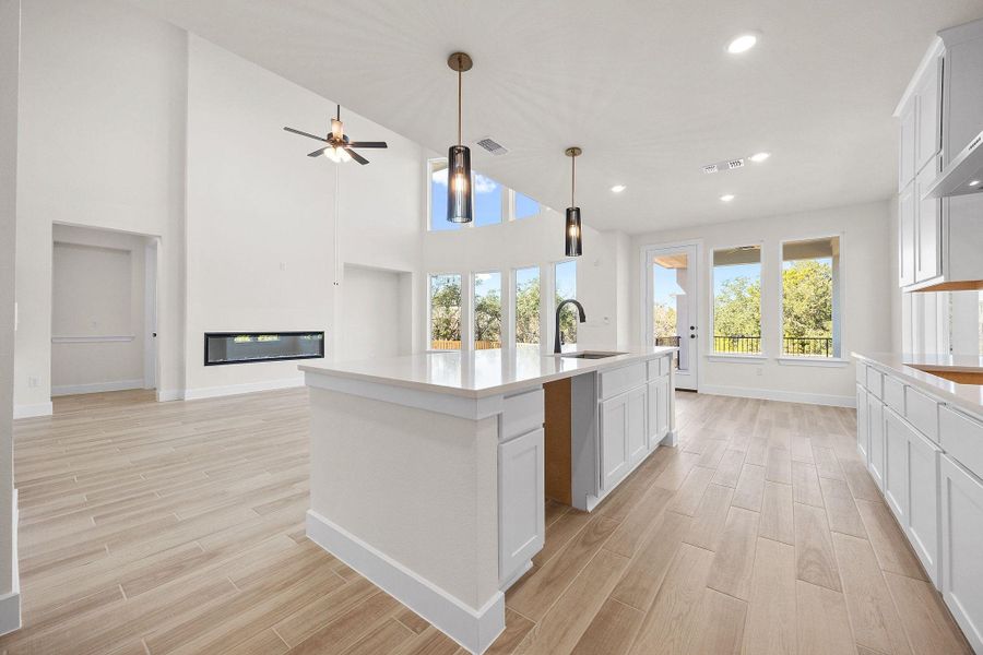 Furnished interior view inside a new home in Bridgeland, Cypress (Image 7).
