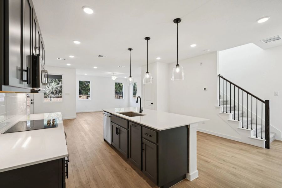 Open Kitchen-Living-Dining Room featuring the Minimalist Collection Open Kitchen-Living-Dining Room featuring the Minimalist Collection