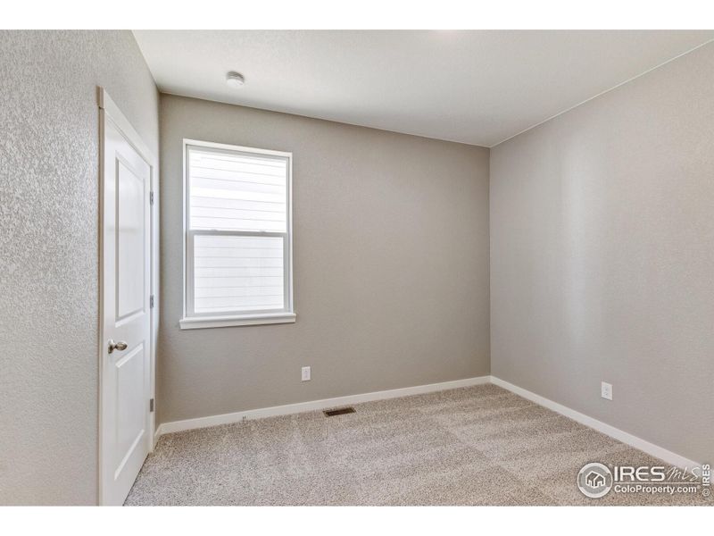 Spacious, unfurnished interior of a new home in Silver Peaks, Lochbuie (Image 19).