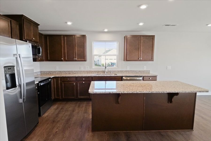 Furnished interior view inside a new home in Reidville Town Center Cottages, Duncan (Image 5).