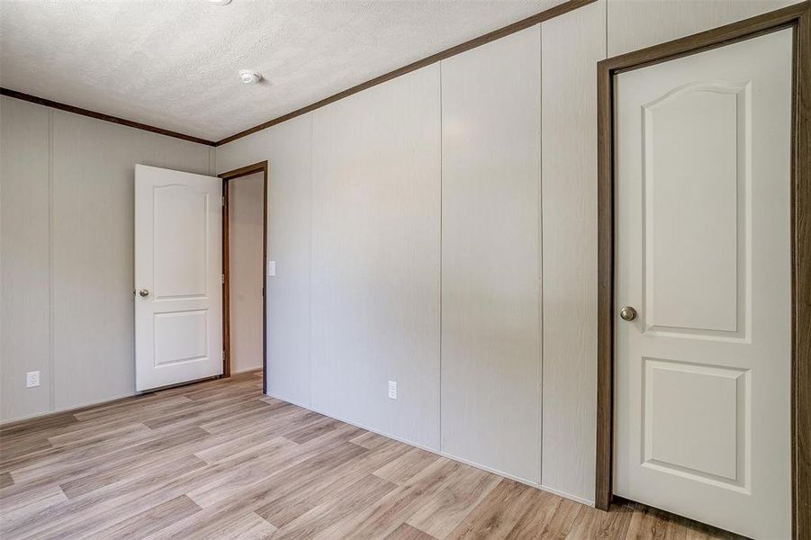 Secondary bedroom with nice size walk in closet