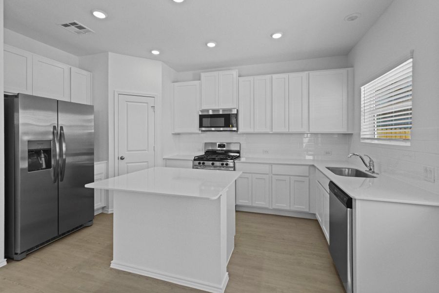 Furnished interior view inside a new home in Sunset Oaks: Ridgepointe Collection, Maxwell (Image 9). Furnished interior view inside a new home in Sunset Oaks: Ridgepointe Collection, Maxwell (Image 9).