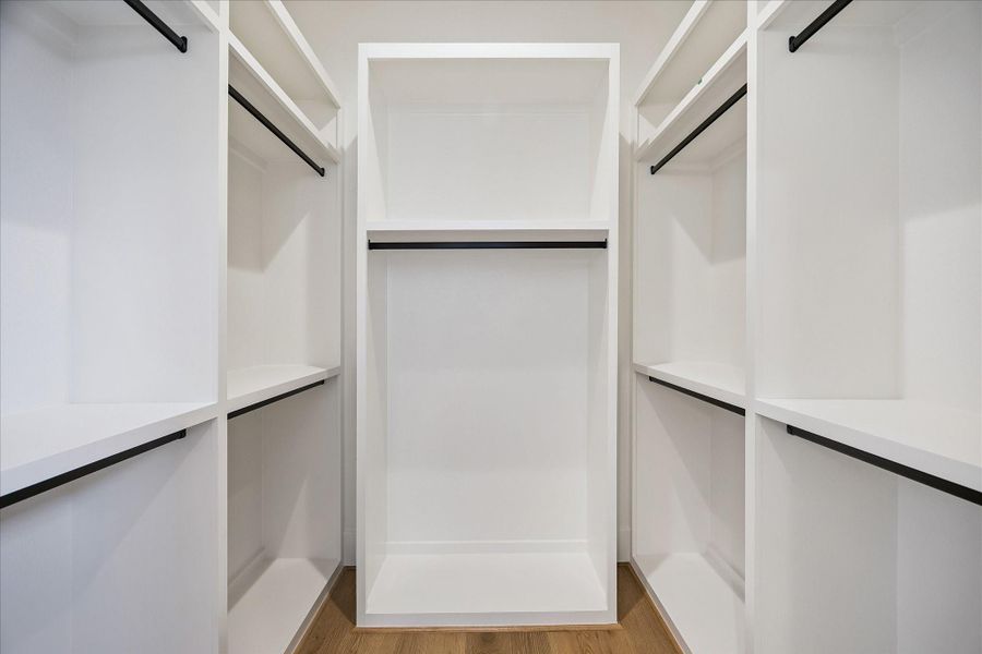 Walk-in closet in secondary bedroom Walk-in closet in secondary bedroom