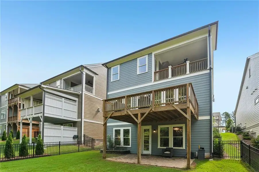 Exterior details and patio area of a home in Lakeside at River Green, Canton (Image 29).