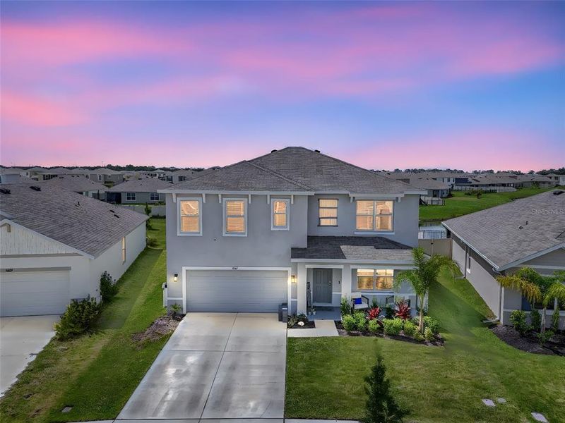 Front exterior of a new home in , Wesley Chapel, FL, highlighting curb appeal (Image 22). Front exterior of a new home in , Wesley Chapel, FL, highlighting curb appeal (Image 22).