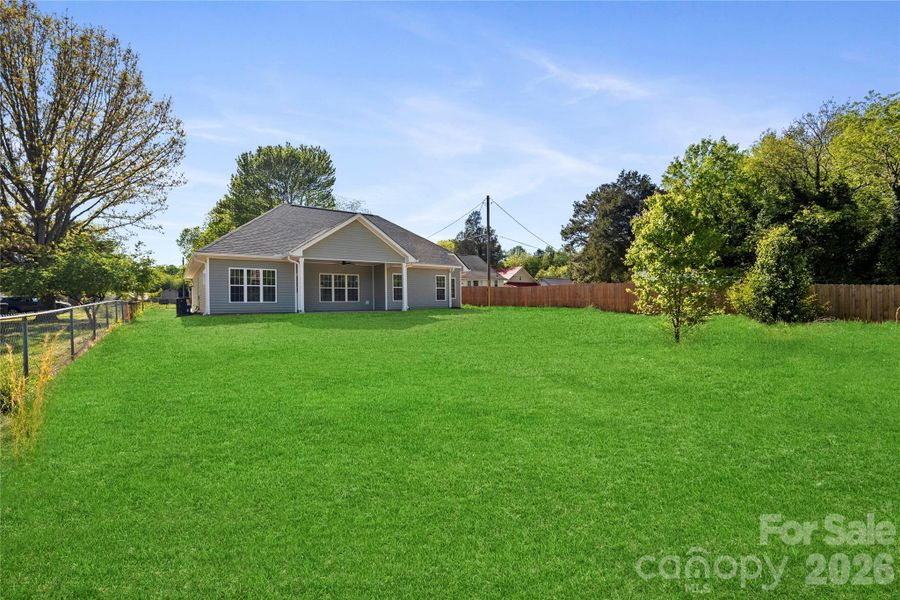 Exterior details and patio area of a home in , Troutman (Image 24).