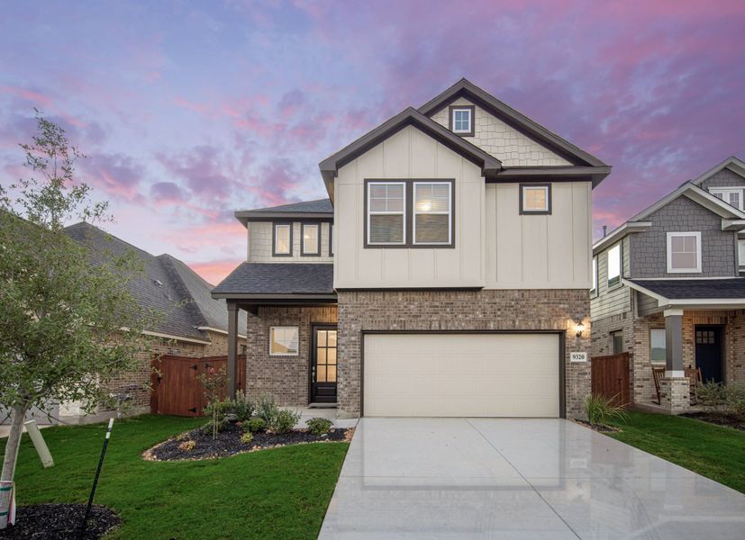 Front exterior of a new home in Stillwater Ranch, San Antonio, TX, highlighting curb appeal (Image 2). Front exterior of a new home in Stillwater Ranch, San Antonio, TX, highlighting curb appeal (Image 2).