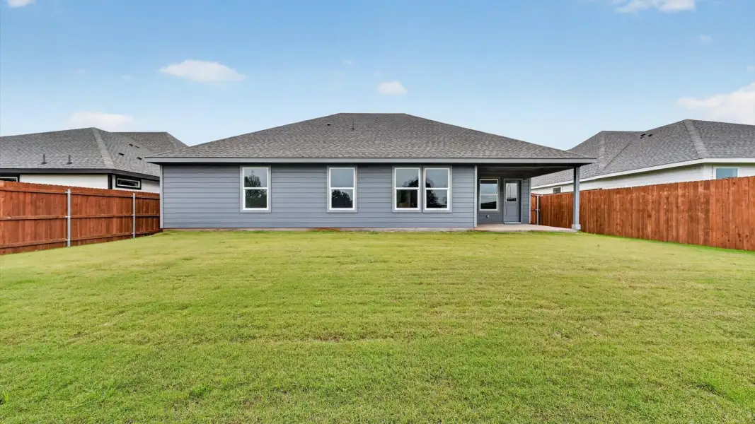Exterior details and patio area of a home in Parkerville Meadows, DeSoto (Image 3).
