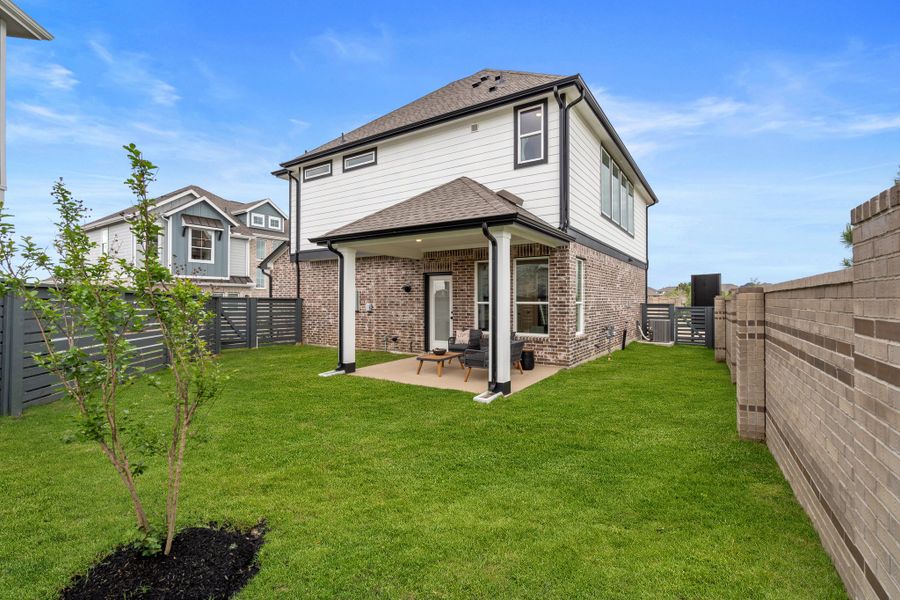 Exterior details and patio area of a home in Bridgeland, Cypress (Image 24). Exterior details and patio area of a home in Bridgeland, Cypress (Image 24).