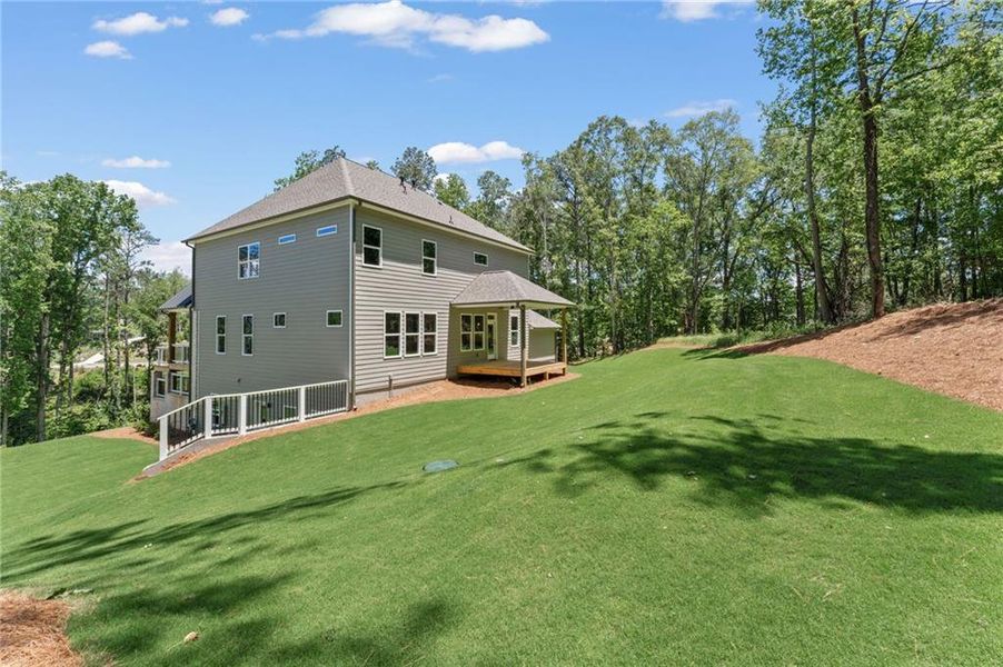 Exterior details and patio area of a home in Liberty Springs, Woodstock (Image 32). Exterior details and patio area of a home in Liberty Springs, Woodstock (Image 32).